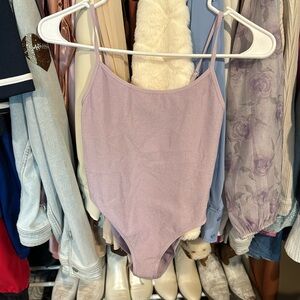 Purple sparkle body suit